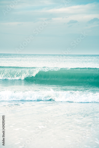 Fototapeta Naklejka Na Ścianę i Meble -  Ocean waves crashing  on the shore