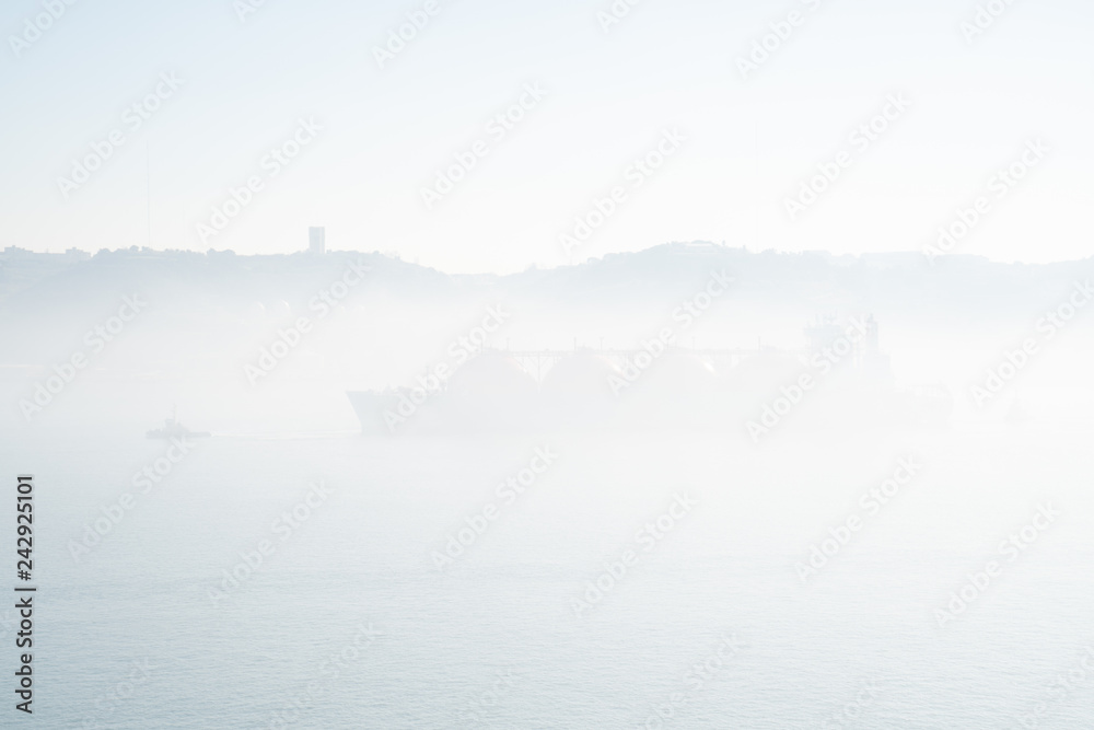 large ship in mist