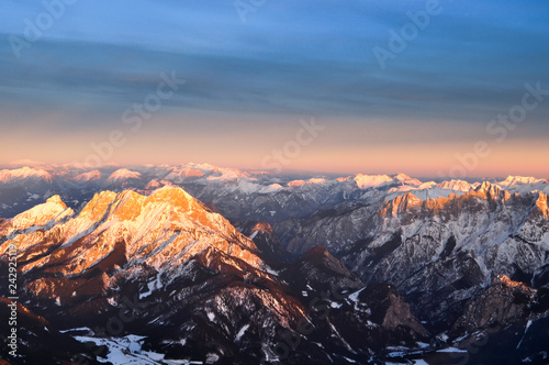 Aerial view of Alpine peaks over Austria in sunset