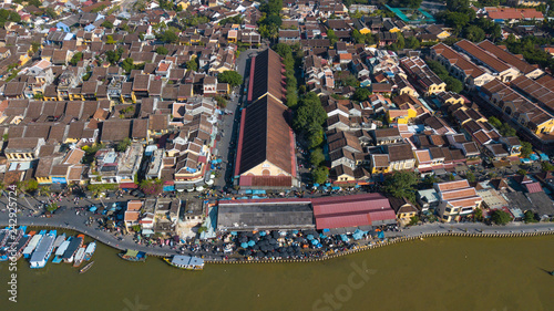 Panorama of Hoian market. Aerial view of Hoi An old town or Hoian ancient town. Royalty high-quality free stock photo image top view of Hoai river and boat traffic in HoiAn market. Hoian city, Vietnam photo