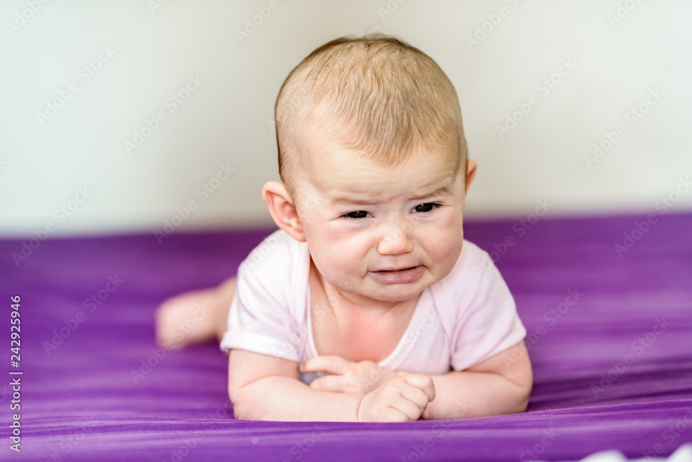 Baby alone angry and crying in his bed Baby alone angry and crying in his bed