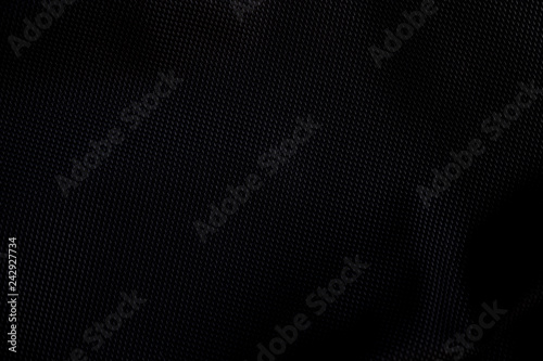 Close up black fabric textile material for background and texture.