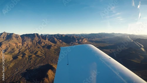 Small Plane Wing View of Superstion Mountains in Tonto National Forest photo