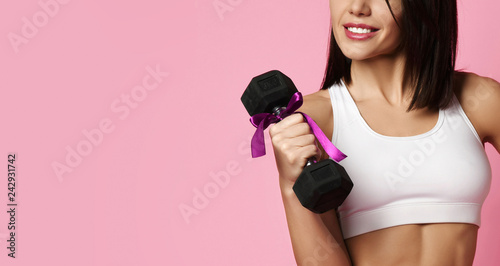 New spring sport workout concept for woman day 8 march. Girl working out with big weight dumbbell © Dmitry Lobanov