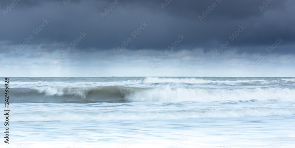 Ocean waves crashing  on the shore