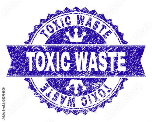 TOXIC WASTE rosette stamp imprint with distress texture. Designed with round rosette, ribbon and small crowns. Blue vector rubber print of TOXIC WASTE caption with corroded texture.