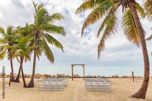 Fototapeta Naklejka Na Ścianę i Meble -  Wedding on beach chairs and altar venue for ceremony background.