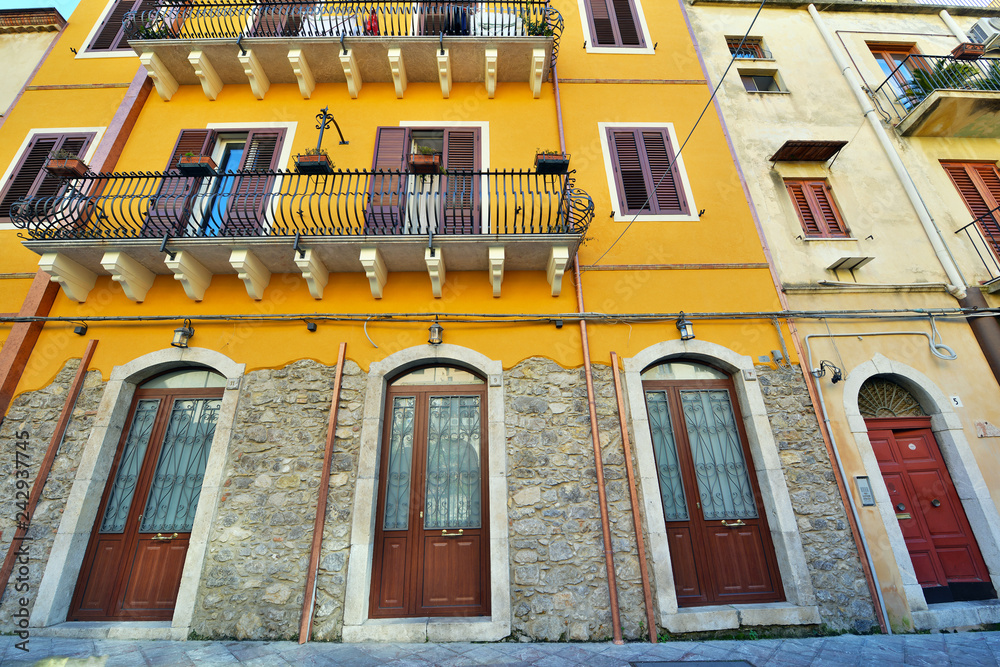 Traditional colorful vintage architecture in small town in Sicily, Italy