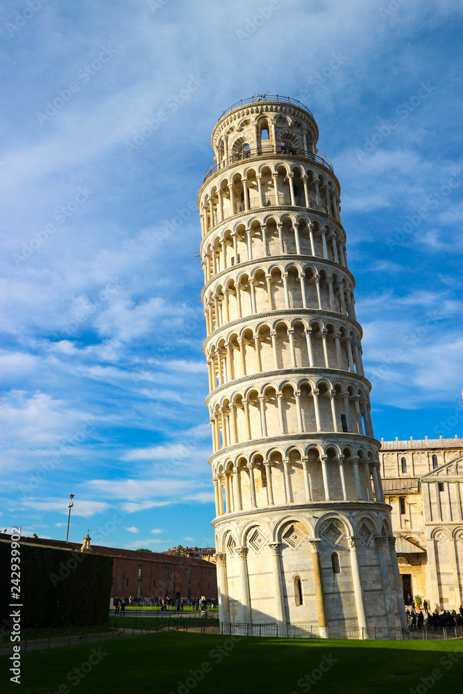 Leaning tower of pisa winter view with a sky and clouds, Tuscany, Italy