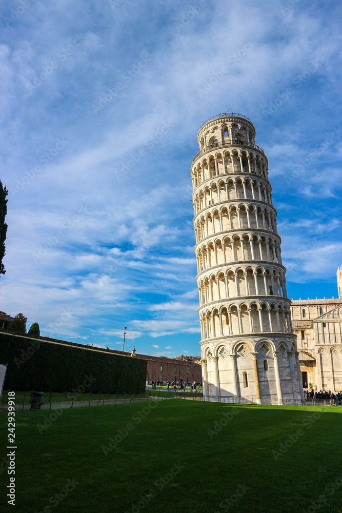 Leaning tower of pisa at winter sunny day, Tuscany, Italy