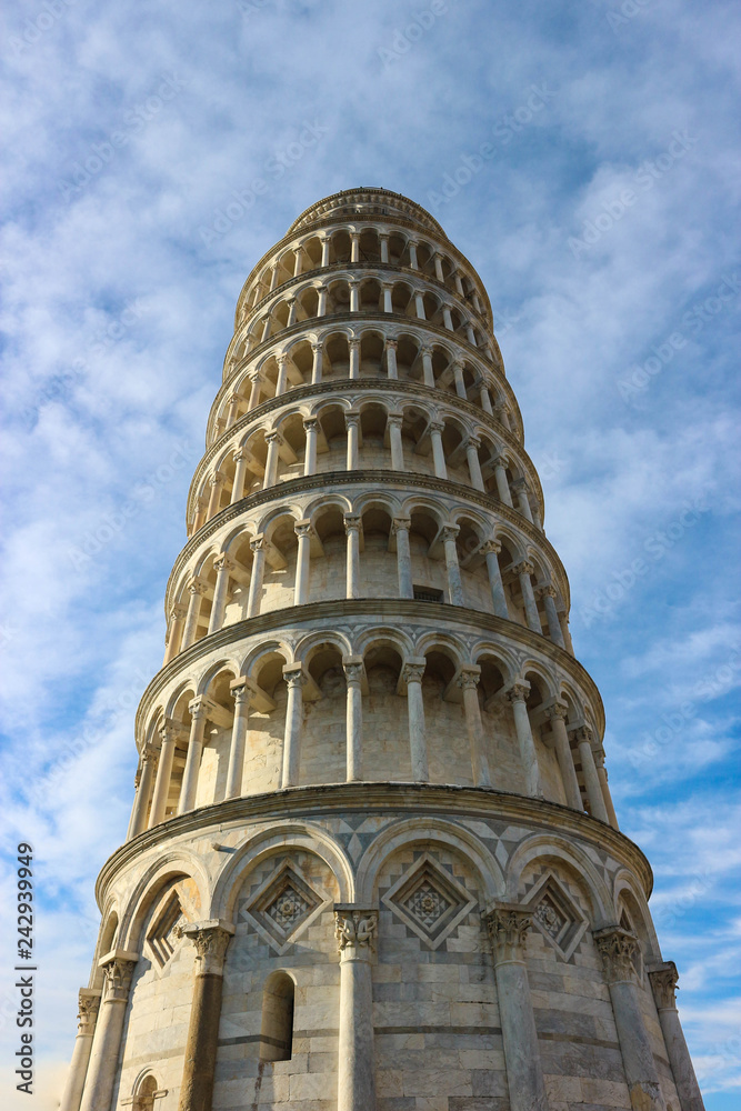 Leaning tower of pisa closeup view with a sky and clouds, Tuscany, Italy