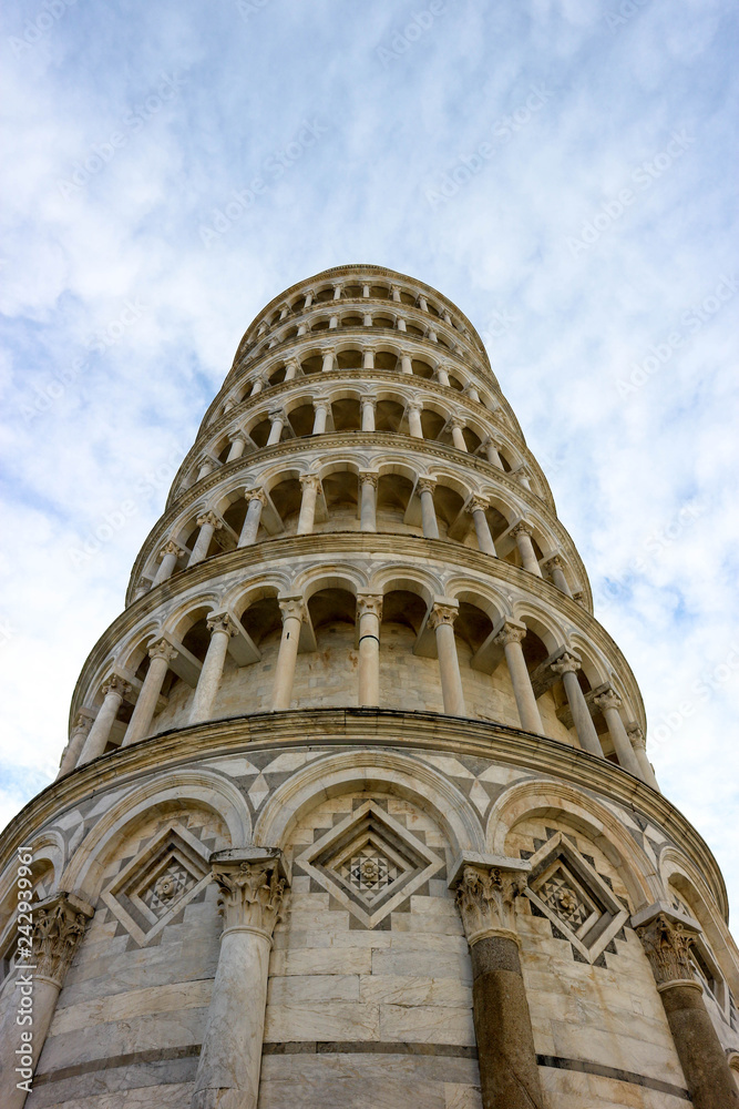 Leaning tower of pisa closeup view with a sky and clouds, Tuscany, Italy