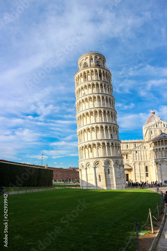 Leaning tower of Pisa at the winter sunny day with the blue sky on the background, Tuscany, Italy