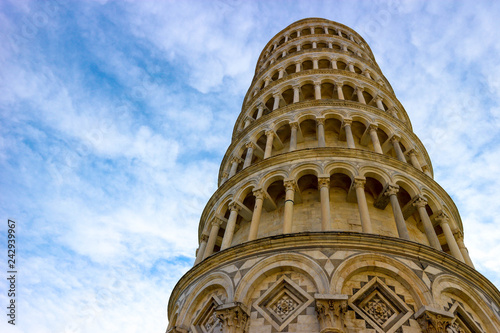 Closeup view to leaning tower of Pisa  symbol of Italy  with the clouds and blue sky on the background