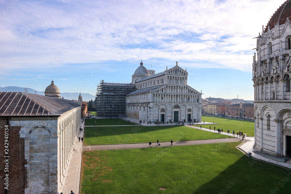 View to piazza dei miracoli (Square of Miracles) with leaning tower of Pisa, cathedral and baptistery, Tuscany, Italy