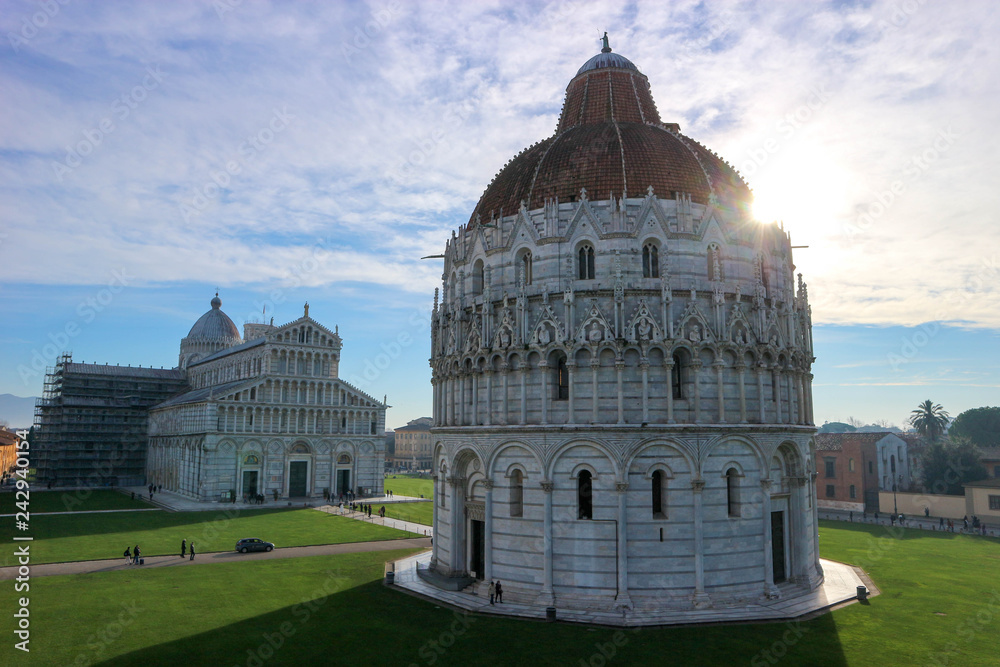 View to piazza dei miracoli (Square of Miracles) with leaning tower of Pisa, cathedral and baptistery, Tuscany, Italy