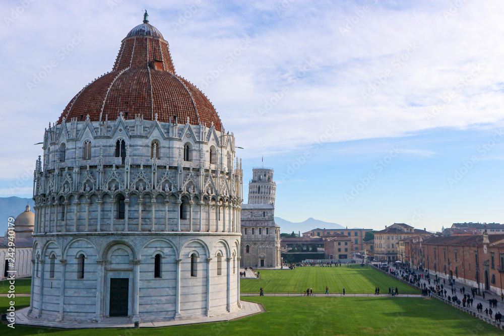 Panoramic view of Piazza dei Miracoli (Square of Miracles) with baptistery, cathedral and leanint tower from Pisa city wall, Pisa, Tuscany, Italy