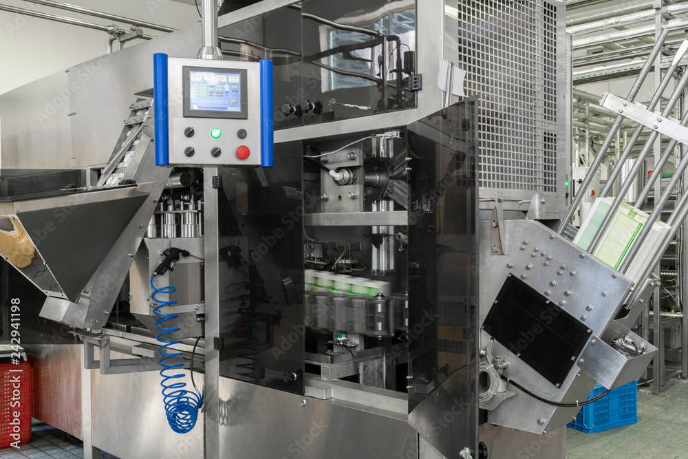 equipment for bottling and packaging of beverages in cardboard containers. equipment at the dairy plant equipment for bottling and packaging of beverages in cardboard containers. equipment at the dairy plant