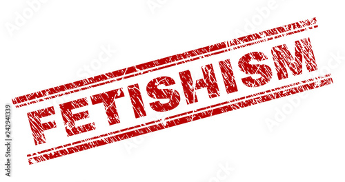 FETISHISM seal stamp with grunge texture. Red vector rubber print of FETISHISM text with unclean texture. Text label is placed between double parallel lines.