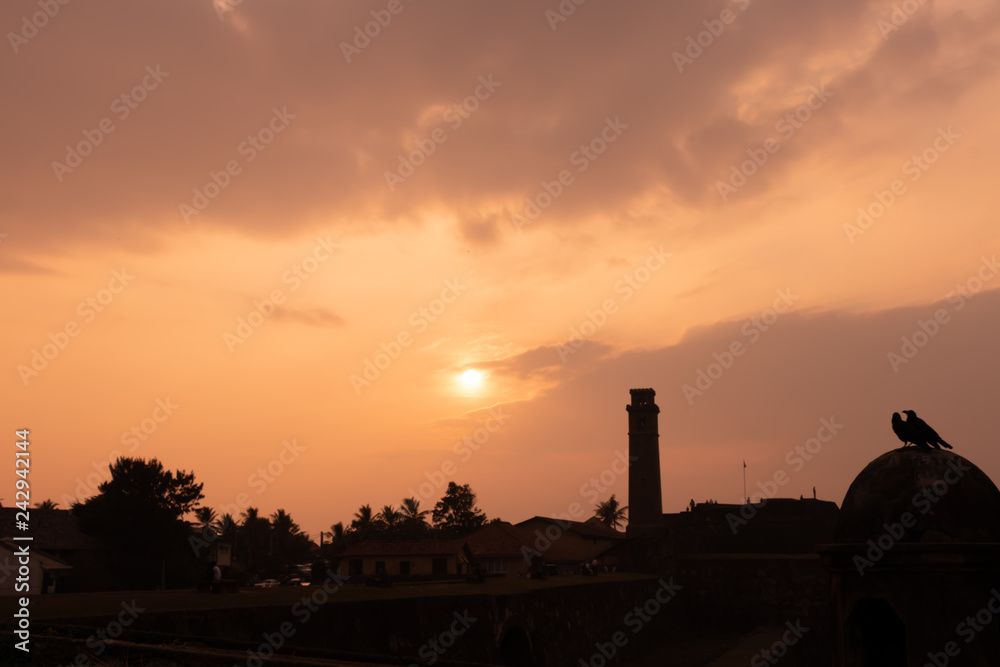 sunset with clock tower gall sri lanka