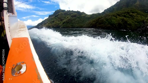 Boat fishing near Tahuata Marquesas Island South Pacific  photo