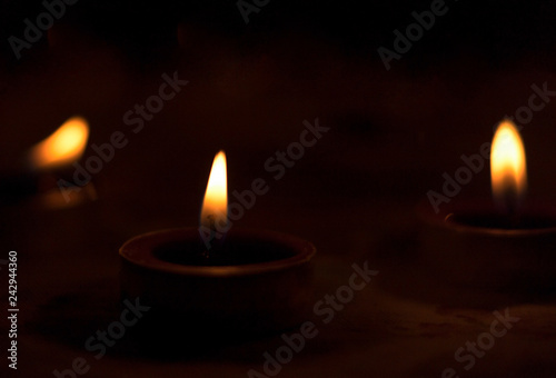 World Religion Dayconcept：Many burning candles with shallow depth of field