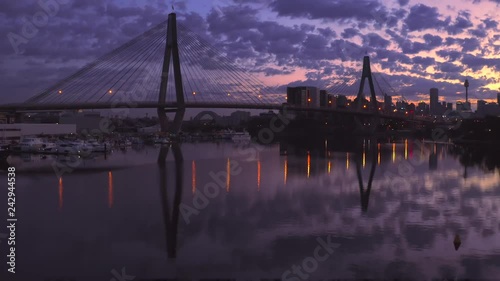 Drone Flying towards the Anzac Suspended Bridge with the Sydney City Skyline in the background