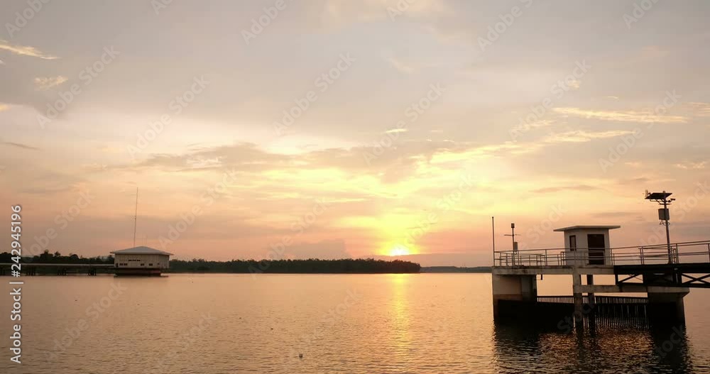 Dokkrai Reservoir and view sunset water reflection at rayong, thailand Dokkrai Reservoir and view sunset water reflection at rayong, thailand