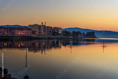 View of Orbetello in lagoon on peninsula Argentario at sunrise. Italy © Elena Odareeva