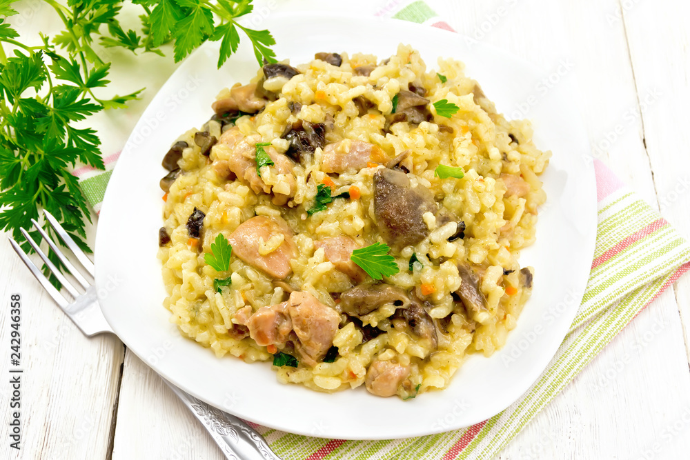 Risotto with mushrooms and chicken on board Risotto with mushrooms and chicken on board
