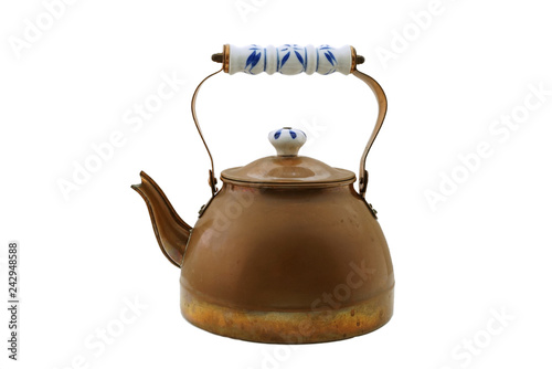 Old copper tea kettle isolated on white