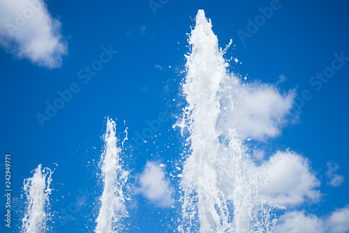 Fototapeta Naklejka Na Ścianę i Meble -  beautiful fountains against the blue summer sky