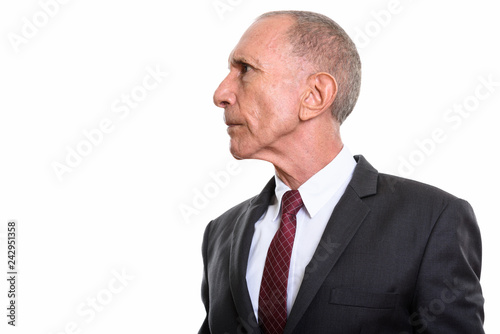 Profile view of senior businessman isolated against white background