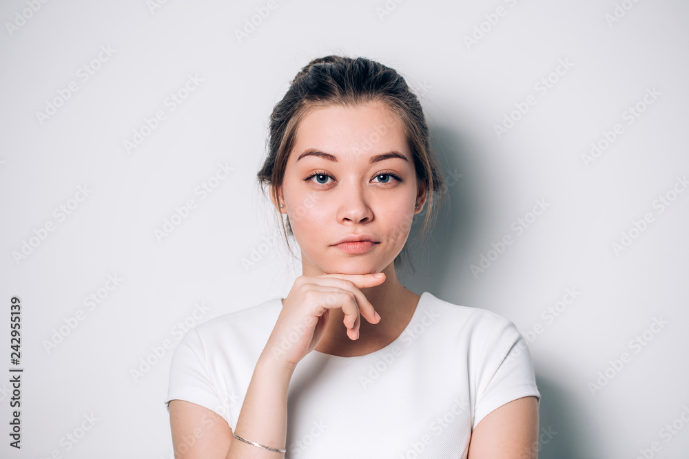 Portrait of beautiful blue eyed girl on a white background Portrait of beautiful blue eyed girl on a white background