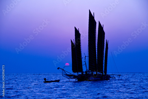 Sailing boat on hongze lake in huai 'an, jiangsu province, China photo