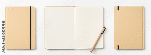 Top view of kraft paper notebook, page, pencil photo