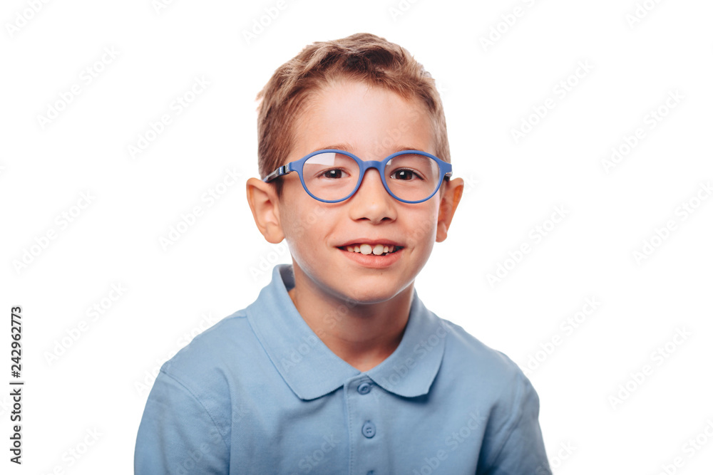 cucasian boy ajusting his eyeglasses and looking at camera over white background. Concept new eyeglasses for good vision cucasian boy ajusting his eyeglasses and looking at camera over white background. Concept new eyeglasses for good vision