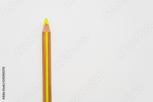 Yellow wooden pencil on white background