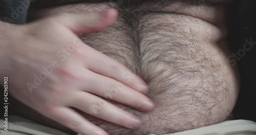 Wallpaper Mural Navel Fluff. fat man check his belly Torontodigital.ca