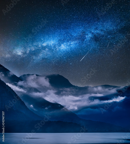 Photography Milky way over fogged mountains in the morning