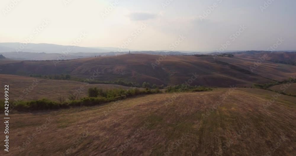 Aerial, gorgeous view on plowed fields landscape in Tuscany Aerial, gorgeous view on plowed fields landscape in Tuscany