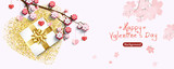 Valentine's day banner. Gifts box and heart with glitter, branches of flowers. Horizontal festive posters, greeting card. Objects viewed from above. Flat lay, top view.