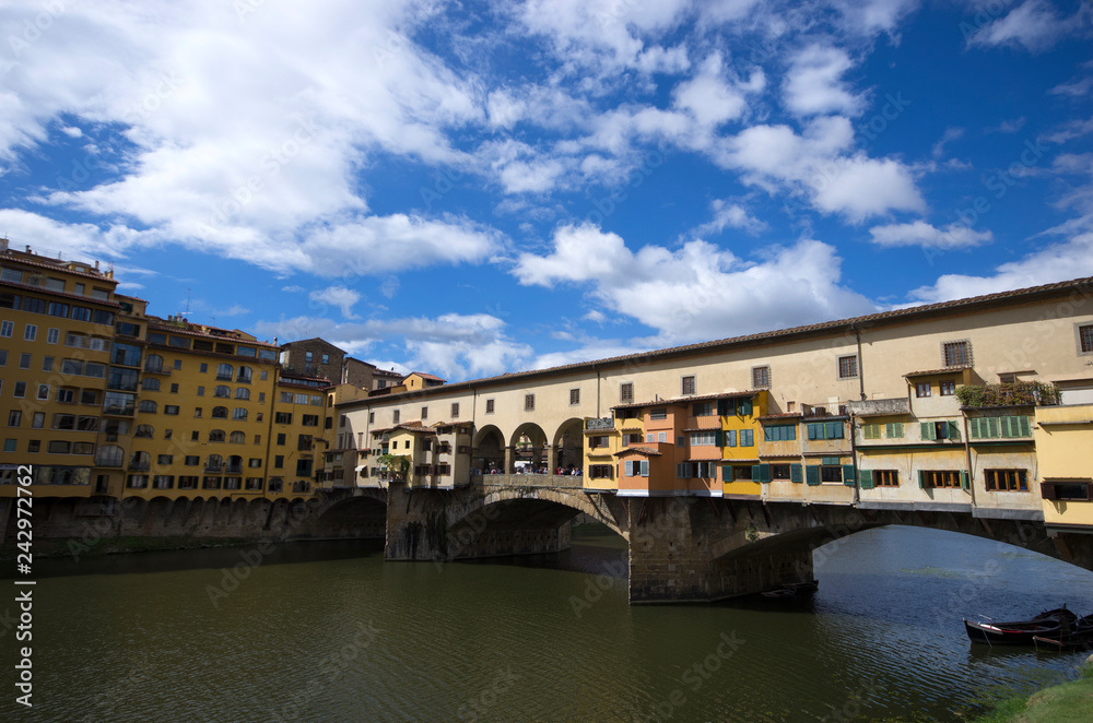 Florence / Italy - September 24 / 2015 : View of Ponte Vecchio, the closed stone bridge over Arno river of Florence