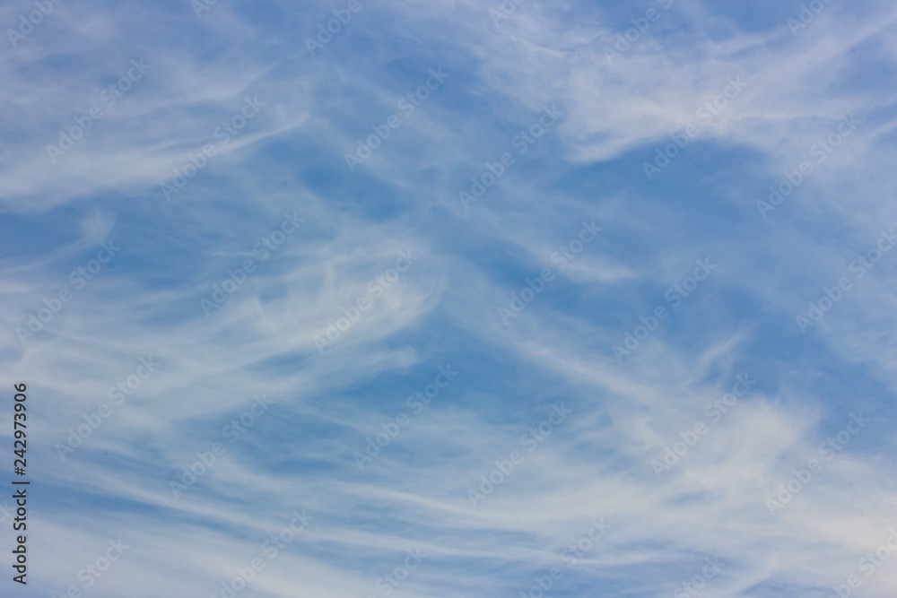 View into the blue sky with clouds View into the blue sky with clouds