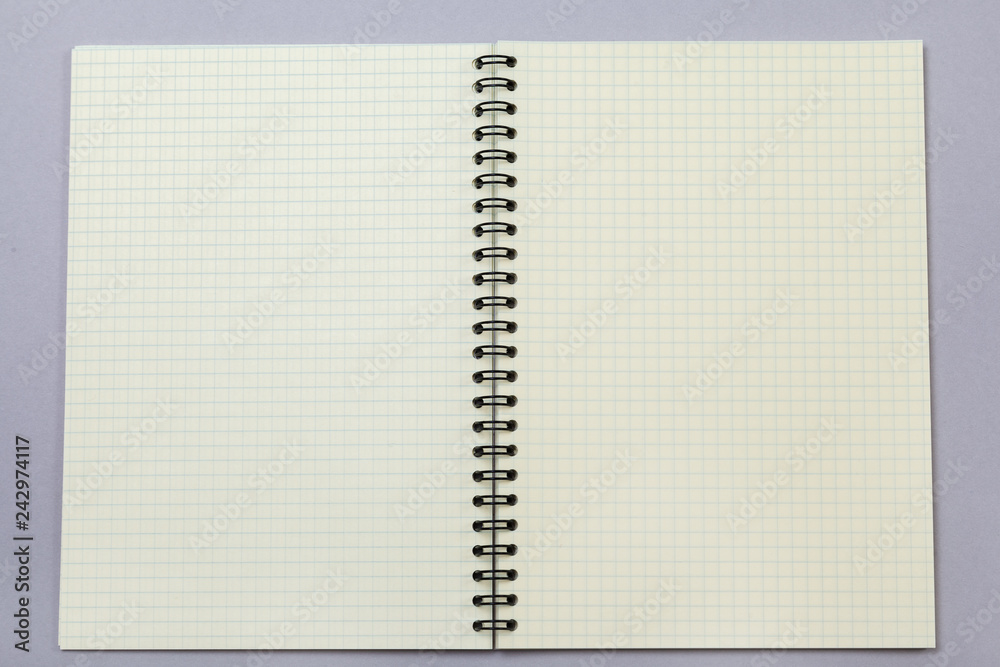 Notepad or notebook on gray background. Concept for education, business photo Notepad or notebook on gray background. Concept for education, business photo