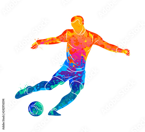 Abstract professional soccer player quick shooting a ball from splash of watercolors