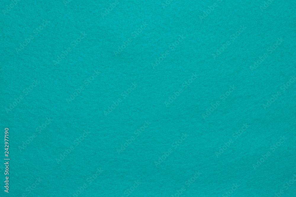 Felt texture pattern background in blue color