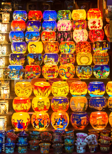 Collection of Traditional glass bowls lamps on sale at Christmas market in Budapest, Istanbul, Moscow, London, Lisbon, Paris, Berlin, Madrid, Rome. Colorful glass,ceramic souvenirs. © kisarpad