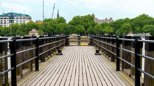 Fototapeta Naklejka Na Ścianę i Meble -  Wooden Pier at River Thames in London