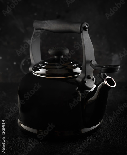 Traditional Black Tea kettle with whistle photo